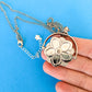 Forget me not blue flower fidget necklace silver back view